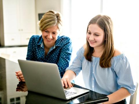 mom and daughter at computer