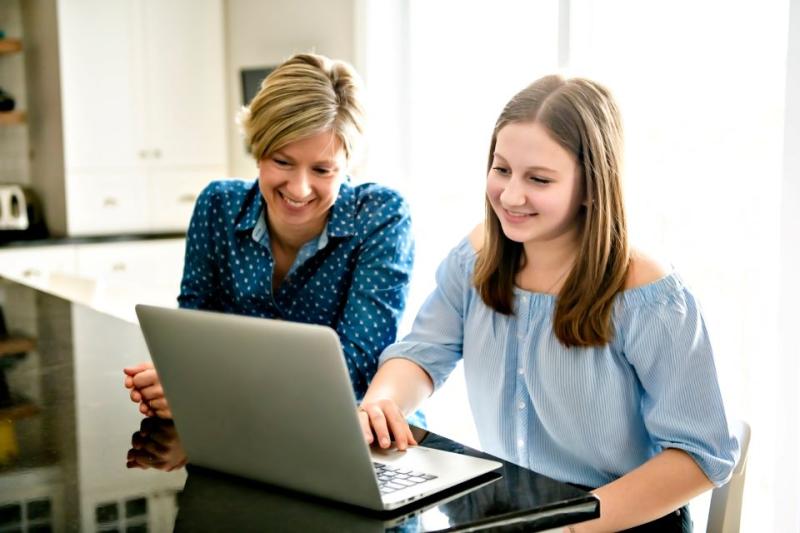 mom and daughter at computer