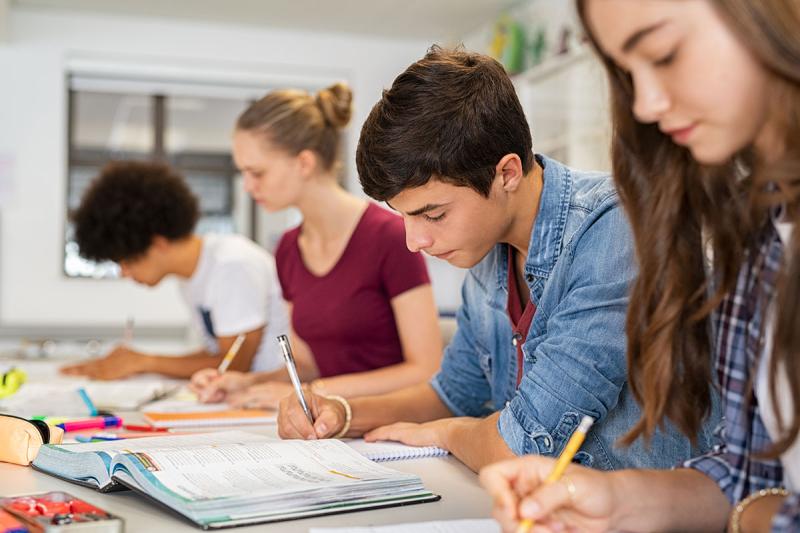 Four students taking a test.